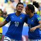 Cristiana Girelli (L) is congratulated by fellow Italy and Juventus teammate Barbara Bonansea after her hat-trick against Jamaica
