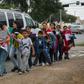 Central American migrant families arrive at a Catholic Charities respite center after being released from federal detention in McAllen, Texas