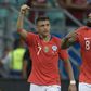 Alexis Sanchez (left) celebrates scoring the winning goal in Chile's 2-1 victory over Ecuador