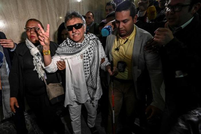 Former FARC guerrilla leader Jesus Santrich (C), was sworn in as a Colombian senator June 11, 2019 but has since disappeared after failing to appear in court to face a US extradition request over drug trafficking charges