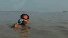 GTV News reporter gains international fame for reporting under dangerous flood water (video)
