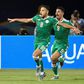 Youcef Belaili (L) celebrates his goal against Senegal