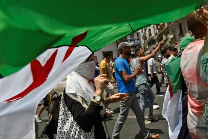Algerian protesters demonstrate in Algiers calling for an overhaul of the country's political system