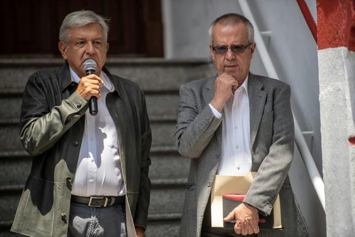 Carlos Urzua (right) says he could not continue working with Mexican President Andres Manuel Lopez Obrador (left) because of their numerous disagreements over fiscal policy