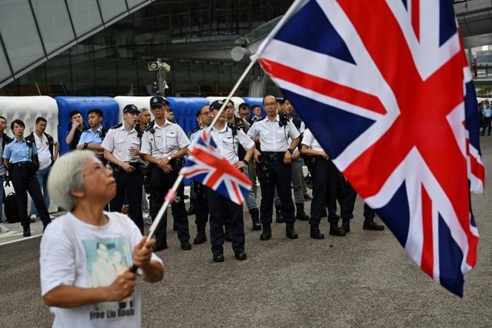 Alexandra Wong says she chooses to wave the Union Flag to express her dissatisfaction with the two decades of Beijing's rule over Hong Kong