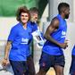 Barcelona's French forward Antoine Griezmann laughs as he runs during the football club's first pre-season training session.