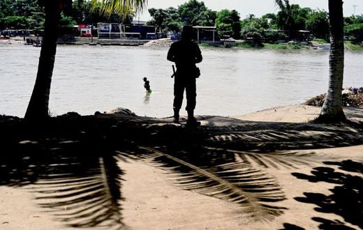 A member of the Mexican National Guard patrols the banks of the Suchiate River in Chiapas State, Mexico, in July 2019 in an effort to prevent illegal migrant crossings