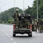 Soldiers aboard a truck patrol during a violent protest by Shiite Muslims demanding the release of their detained leader Ibrahim Zakzaky on July 23, 2019 in Abuja. At least eight people were killed in clashes between Shiite Muslim protesters and Nigeri...