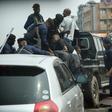 Police officers clash with protesters during a Kinshasa rally to mark the 59th anniversary of DR Congo's independence