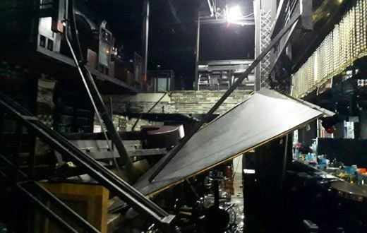 The balcony collapsed under the weight of party-goers and dropped around five metres
