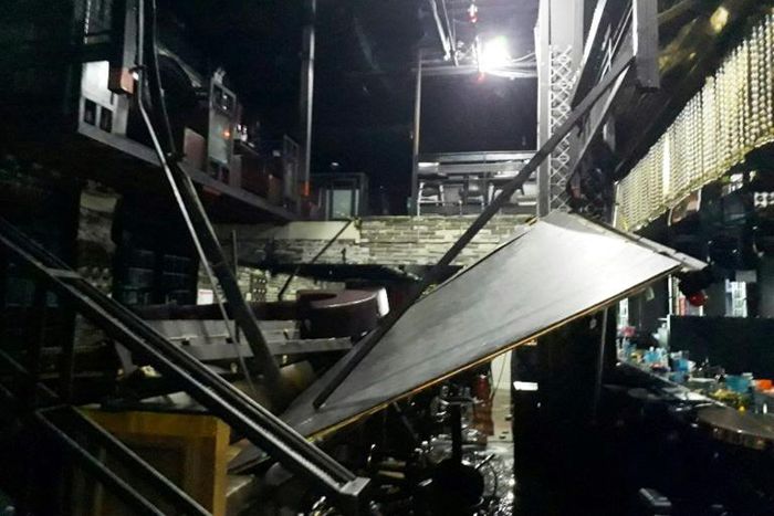 The balcony collapsed under the weight of party-goers and dropped around five metres