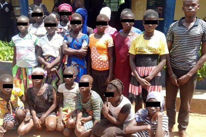 The suspect in a pose with the victims