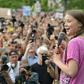 Swedish teenage activist Greta Thunberg addresses a rally in Berlin, while Chancellor Angela Merkel praised her nearby in the German capital
