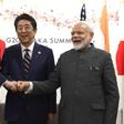 President Donald Trump opted for a jovial fist bump with Japanese Prime Minister Shinzo Abe and India's Narendra Modi