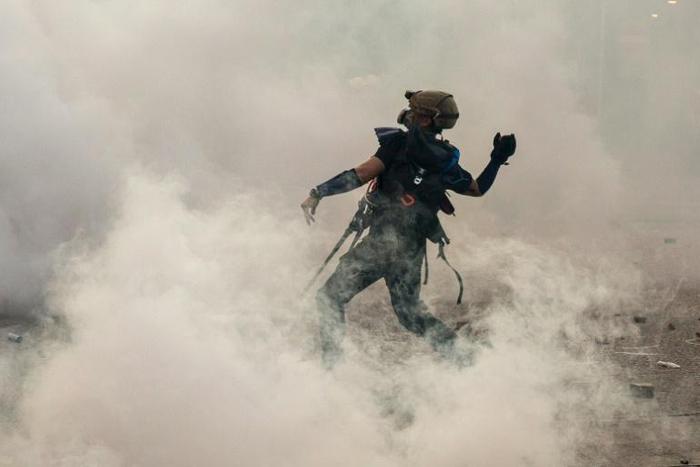 Police have ramped up their use of tear gas as two months of rallies in the global financial hub have turned increasingly violent