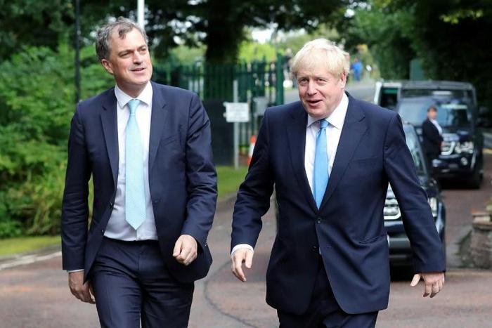 Johnson (R) was accompanied by Britain's Northern Ireland Secretary Julian Smith (L) on his visit to Belfast