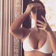Kim K Shows Off Toned Abs In Bikini Pic
