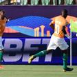 Jonathan Kodjia (L) celebrates after scoring the winner for Ivory Coast