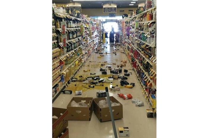 This picture courtesy of Rex Emerson shows broken bottles and other goods in a store in Lake Isabella, California after a 6.4 magnitude quake hit Southern California on July 4, 2019