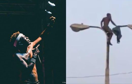 Shatta Wale fan climbs a light pole to watch him perform