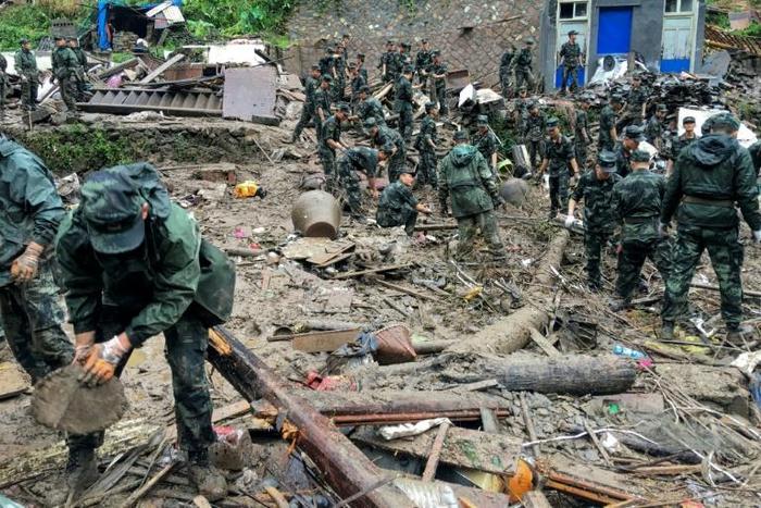 Search and rescue teams are trying to find more than a dozen people still missing after the typhoon struck Wenling city in eastern China