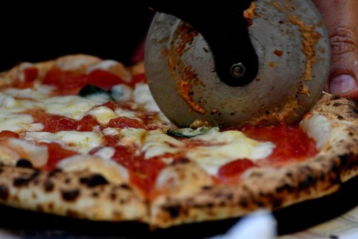 A new South African pizza made with cannabis oil won't maker diners high, says the restaurant chain's supplier, but it might confer calming effects when eaten
