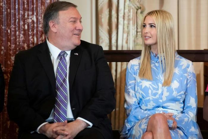 US Secretary of State Mike Pompeo sits next to Ivanka Trump, President Donald Trump's daughter and adviser, as he presents an annual report on human trafficking