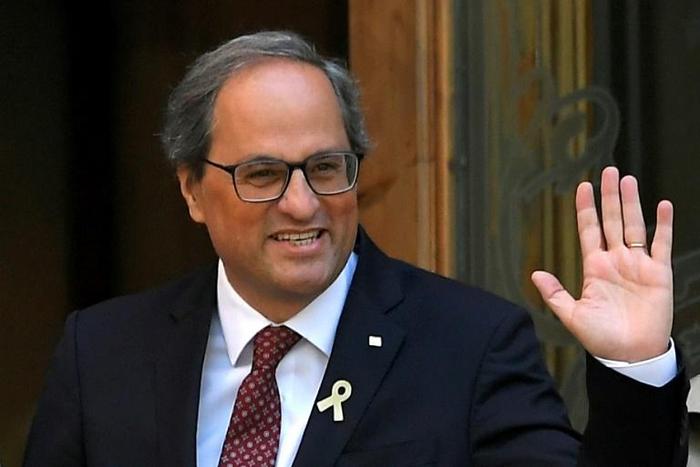 (FILES) In this file photo taken on May 15, 2019 Catalan President Quim Torra arrives at the TSJC (Superior Court of Justice of Catalonia) in Barcelona to be questioned by a judge over disobedience charge. The separatist president of Catalonia is to be...