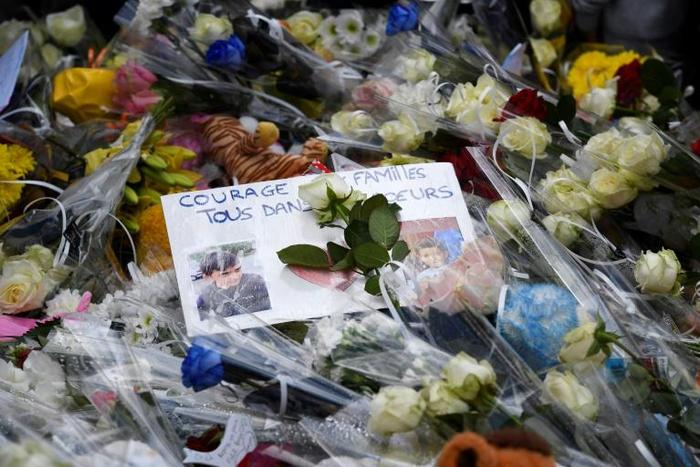 Around 1,000 people joined a silent march through the northwestern French town of Lorient, laying flowers at the site of the deadly hit-and-run incident