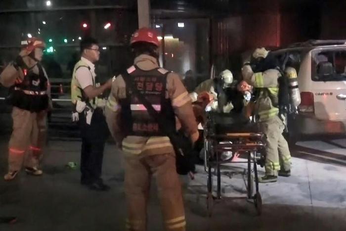 The man in his 70s started a fire inside his vehicle parked in front of the Japanese embassy building and later died in hospital