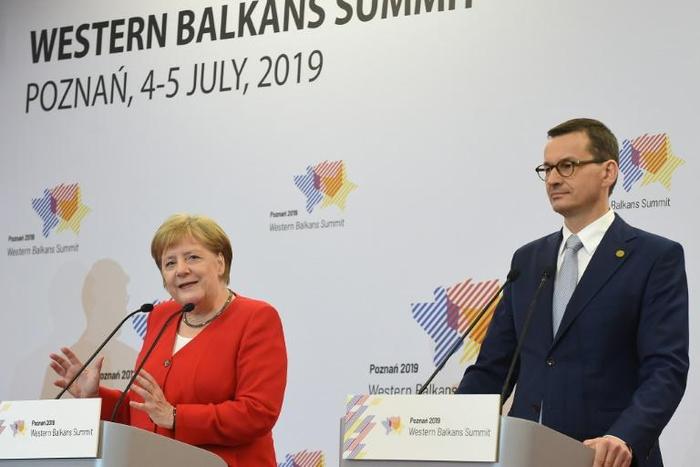 German Chancellor Angela Merkel and Polish Prime Minister Mateusz Morawiecki speaking after the Western Balkans Summit
