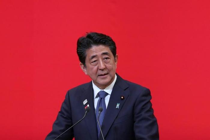 Japanese Prime Minister Shinzo Abe was praised in a YouTube video played to the staff of a major South Korean cosmetics firm
