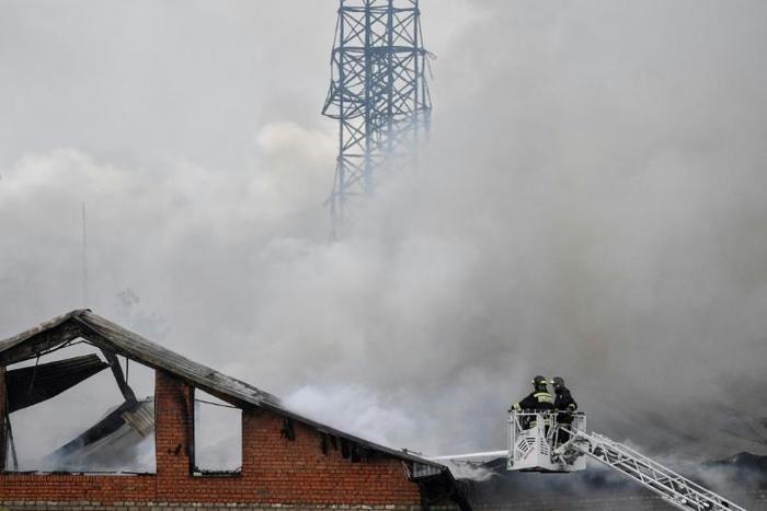 Firefighters battled a fire that broke out at a gas-fired power station just outside Moscow, killing a worker