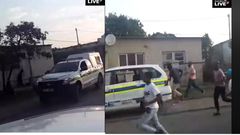 Terrified police officers abandon vehicle, run helter-skelter to avoid lynching by stone throwing mob (video)