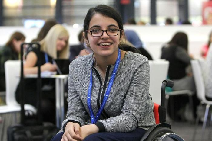 Nujeen Mustafa, a 20 year old Syrian with cerebral palsy, seen in 2016 in Frankfurt, Germany, where she traveled in a wheelchair with her family