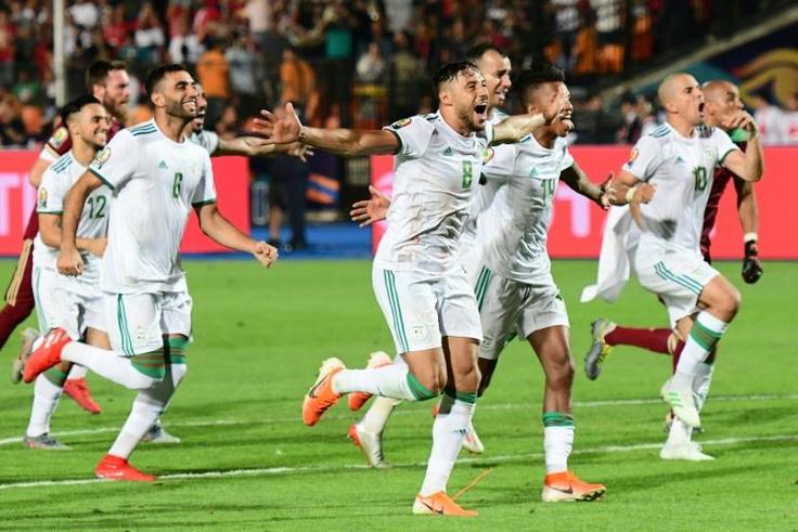 Algeria players celebrate their victory over Senegal in the Africa Cup of Nations final