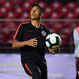 Chile coach Reinaldo Rueda (right) must decide whether or not to play Alexis Sanchez in Monday's clash with Uruguay