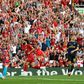Streaking clear: Mohamed Salah (centre) scored twice in Liverpool's win over Arsenal