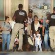 Migrants being detained by Department of Homeland Security officials in June 2019 after crossing into the United States from Mexico: a new rule announced by the White House Monday says most migrants will be automatically ineligble for asylum