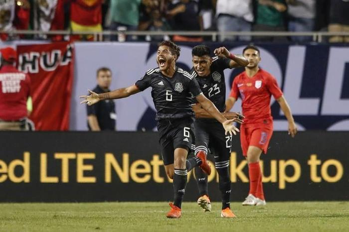 Mexico's midfielder Jonathan dos Santos celebrates after his goal seals a Gold Cup final victory over the USA