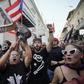 Demonstrators protest in front of the mansion of Puerto Rico's Governor, Ricardo Rossello, known as La Fortaleza, in San Juan, Puerto Rico, on July 24, 2019