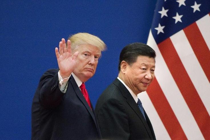 US President Donald Trump says he and China's President Xi Jinping (R) plan to have an "extended meeting" at the G20 summit in Japan
