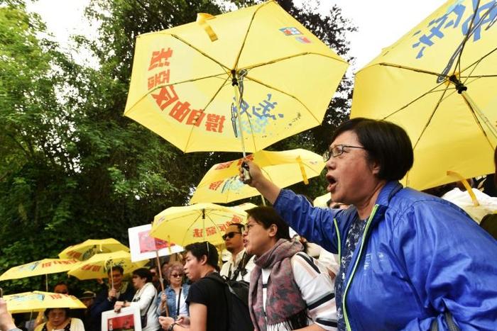 Hundreds of demonstrators gathered in front of the Chinese consulate in Vancouver to protest plans to allow extraditions from Hong Kong to the Chinese mainland