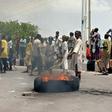 Protesters block a main road in the northern Nigerian city of Maiduguri, demanding the authorities ban a local anti-Boko Haram militia they say is abusing them