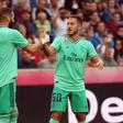 Eden Hazard celebrates scoring with teammate Karim Benzema