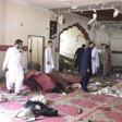 Security officials examined the site of a blast at a mosque in the town of Kuchlak that killed the Afghan Taliban leader's brother in southwest Quetta on August 16, 2019