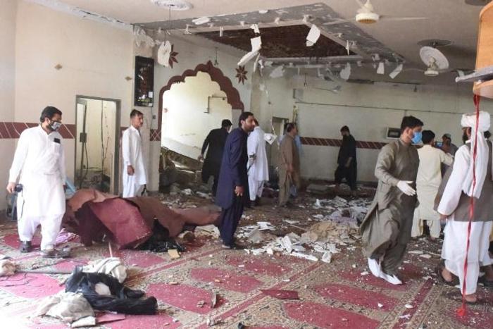 Security officials examined the site of a blast at a mosque in the town of Kuchlak that killed the Afghan Taliban leader's brother in southwest Quetta on August 16, 2019