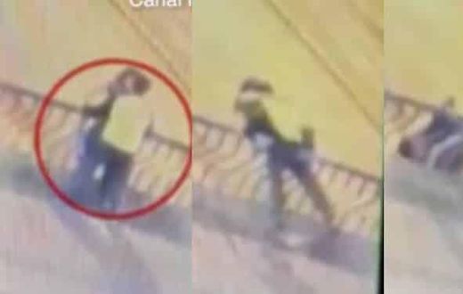 Couple from night club falls 50ft to death as they engage in passionate kissing on a bridge (video)