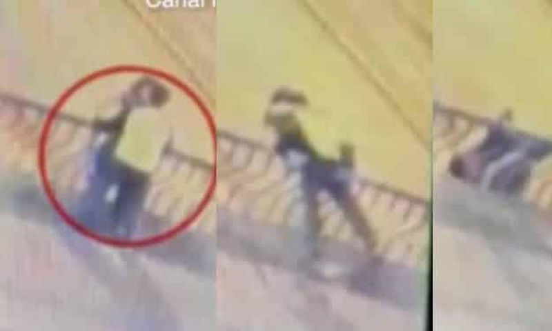 Couple from night club falls 50ft to death as they engage in passionate kissing on a bridge (video)