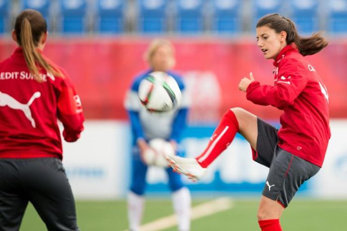 Swiss player Florijana Ismaili (R) takes part in a training session at the FIFA Women's World Cup at Clark Stadium in Edmonton, Canada on June 13, 2015